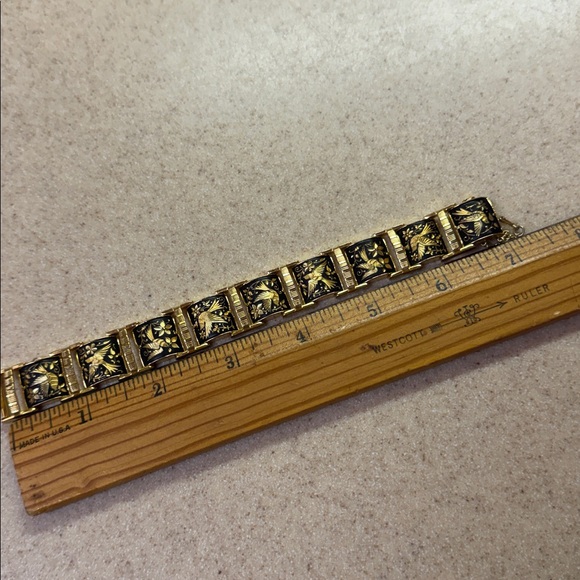 Bird bracelet. Gold tone with black and golden colored birds. - Picture 7 of 8